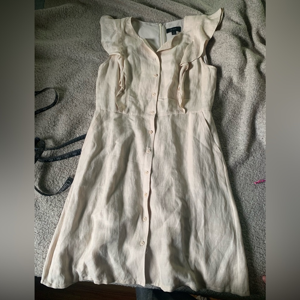 J. Crew creamy beige a line dress. Zip up at back. Size 8. Silk shell.